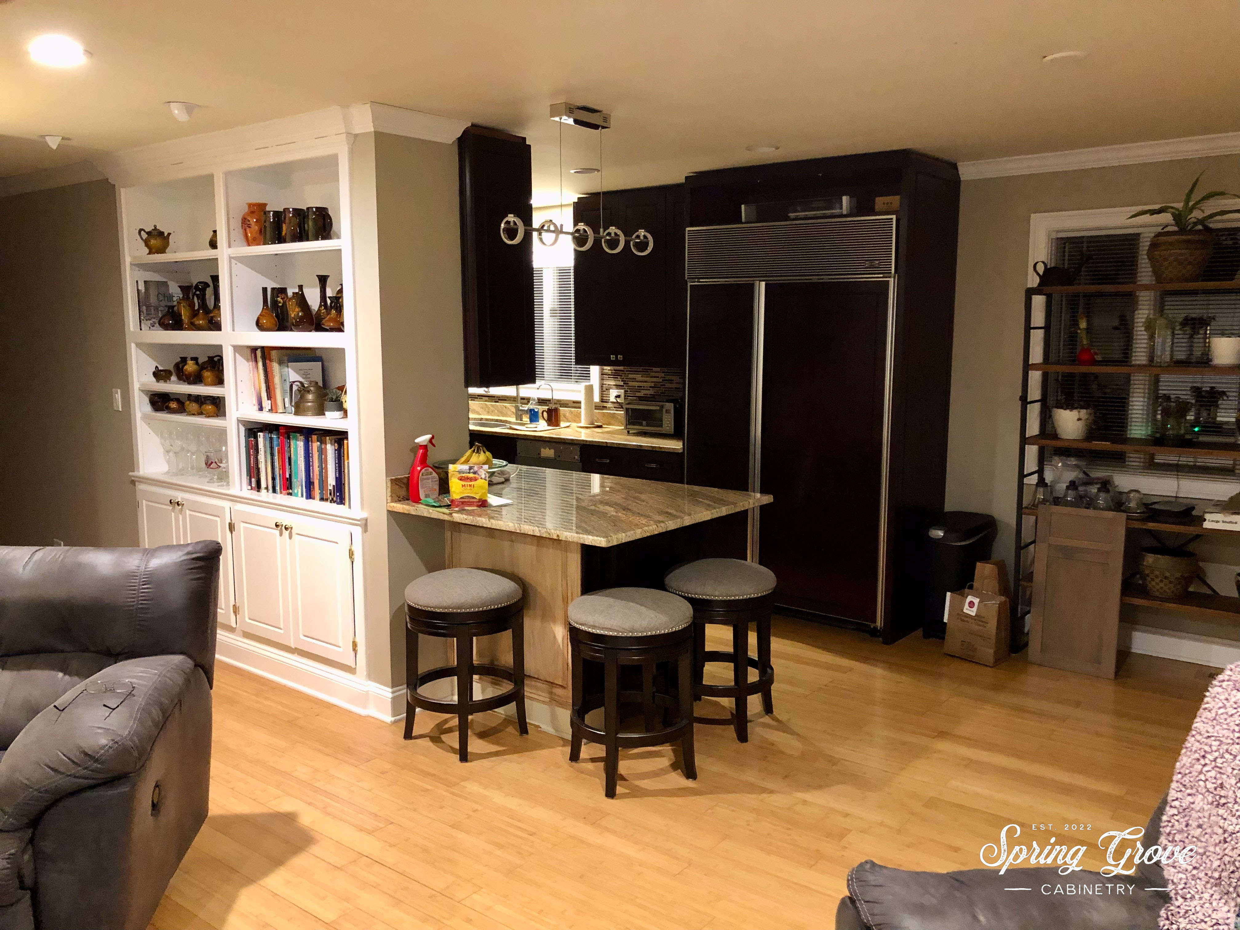 BEFORE: Wall dividing the rooms.