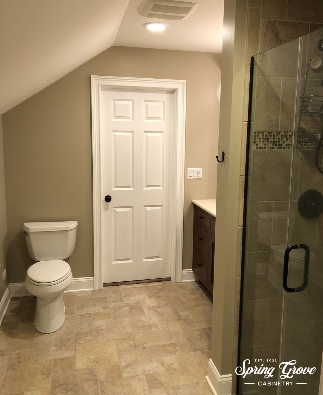 The private bathroom with an adjacent walk-in closet.