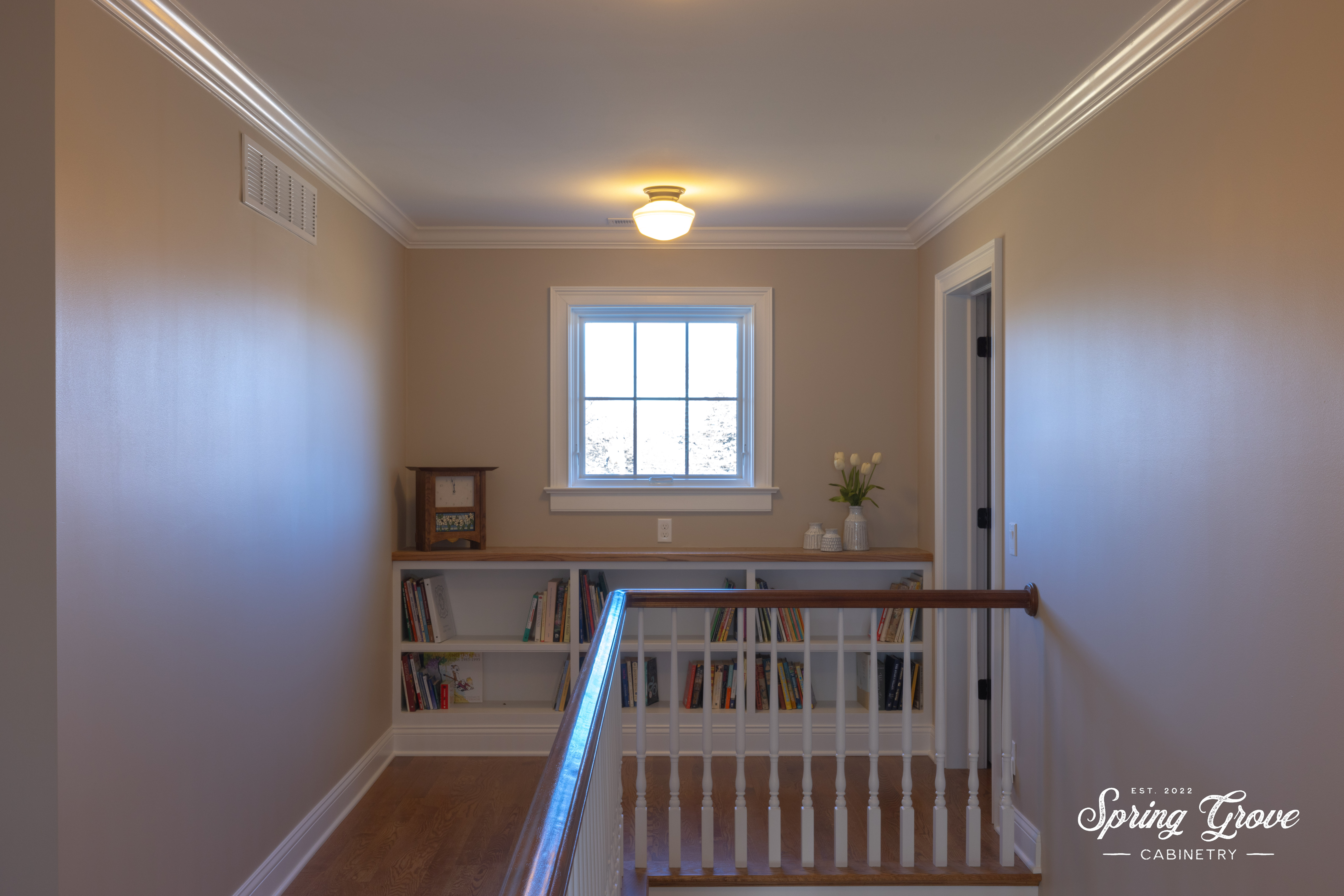 This custom book shelf is a through back to farm house of yesteryear. Grab a book as you pass by to retire for the night.