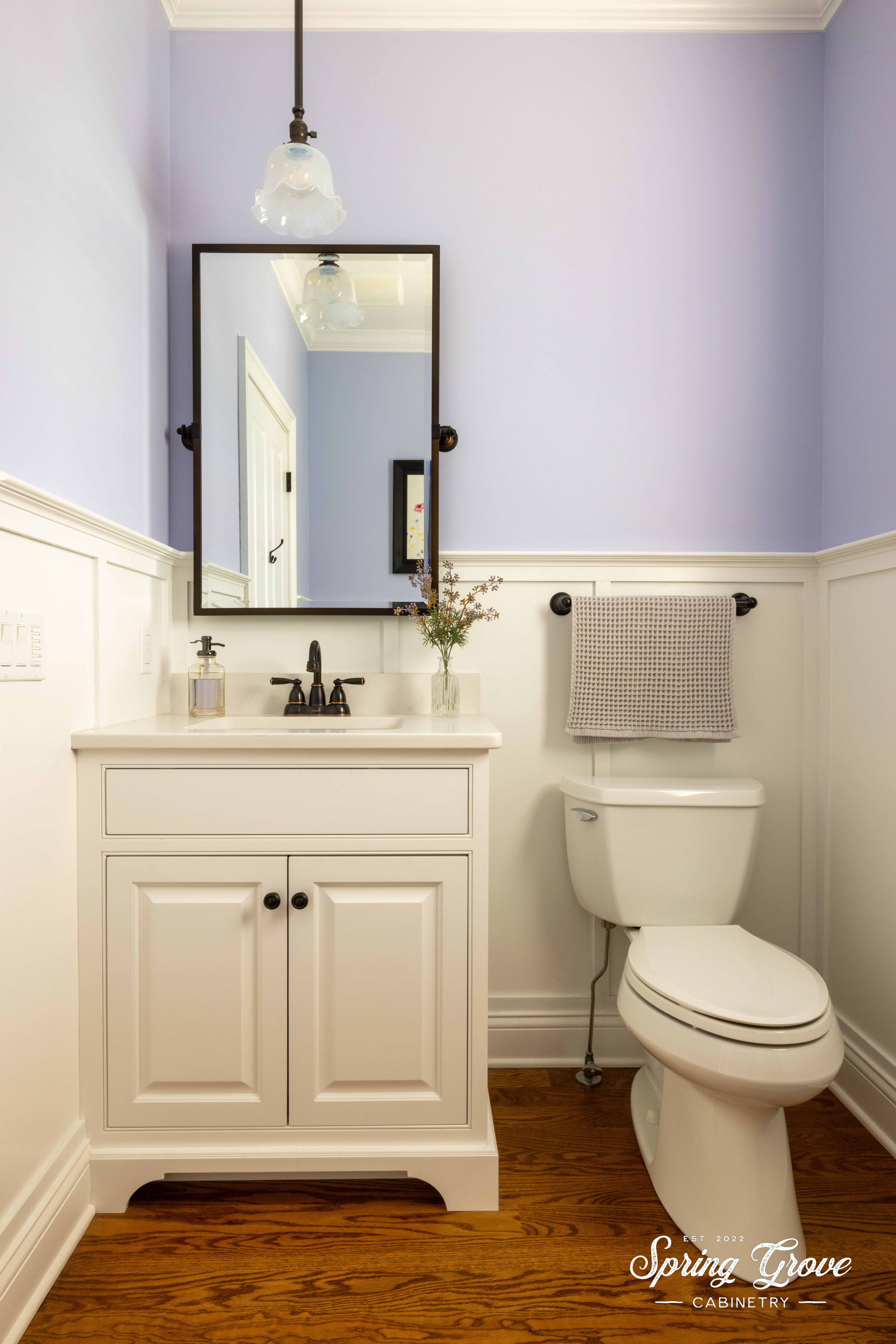 This lovely beaded inset vanity perfectly compliments the powder room.